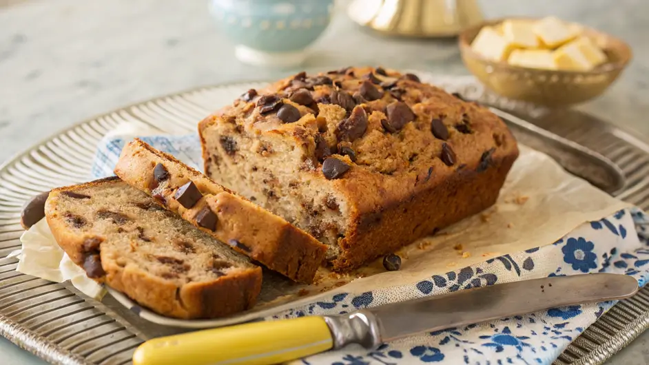 Freshly baked Chocolate Chip Banana Bread with melted chocolate chips and a golden, soft texture